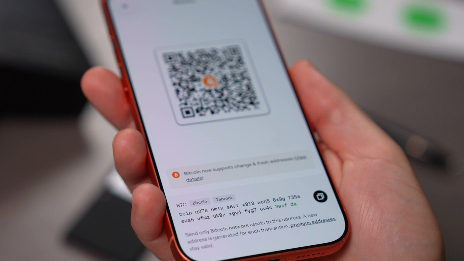 Phone displaying QR code for Bitcoin address sharing