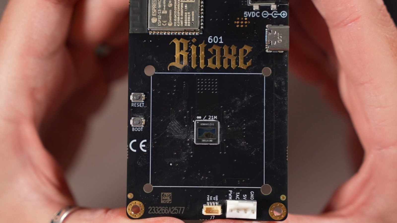 Bottom of Bitaxe PCB with reset and boot button locations